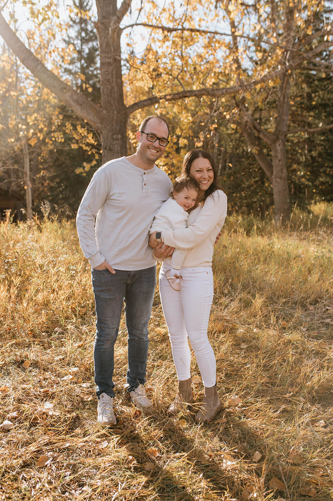 Parents-smile-holding-baby