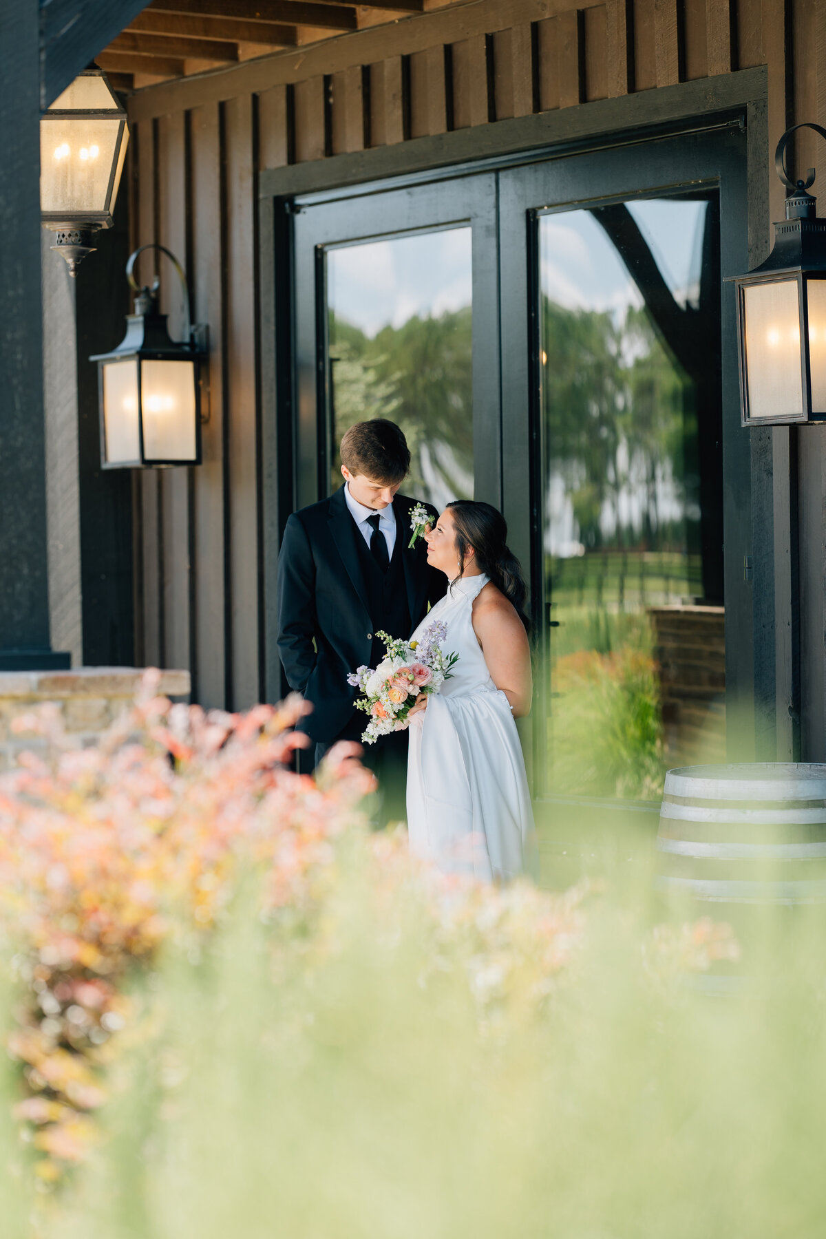 bride and groom sharing a private moment on their wedding day