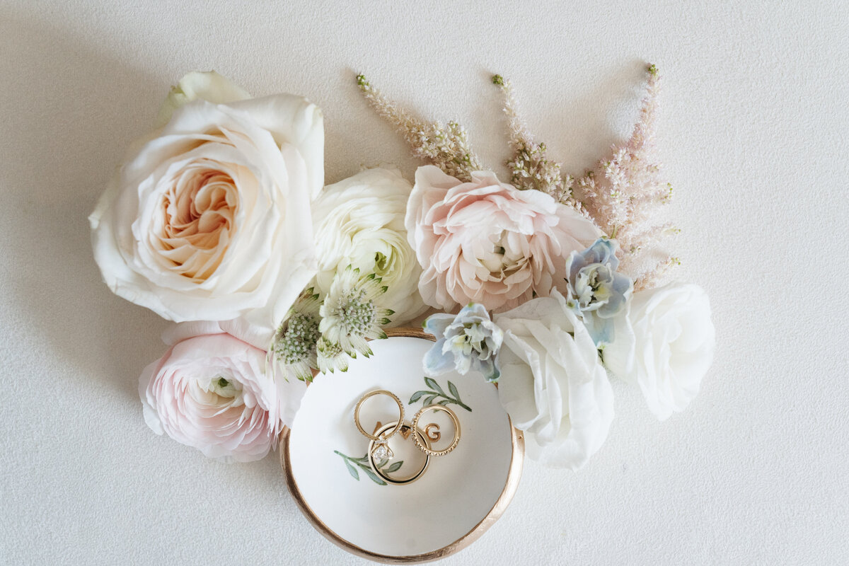 Detail flat lay with wedding rings and stationery at Waverly Oaks