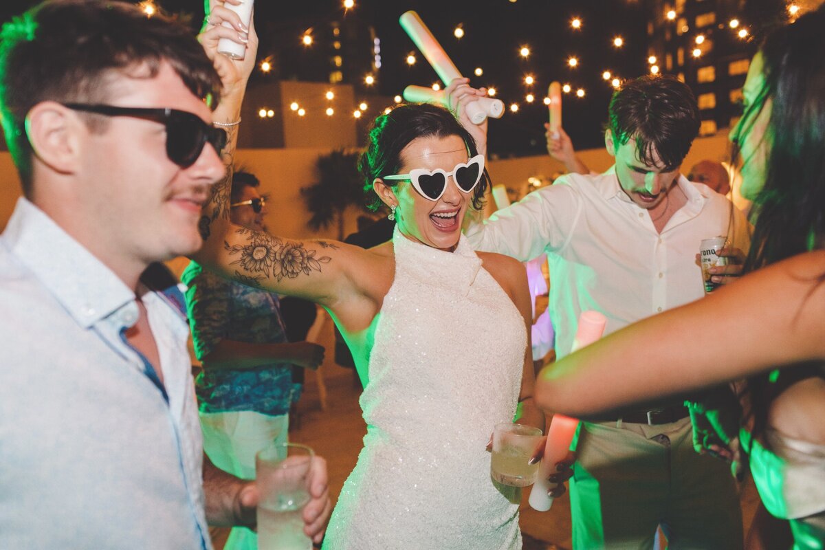 Bride dancing with her guests at wedding in Cancun