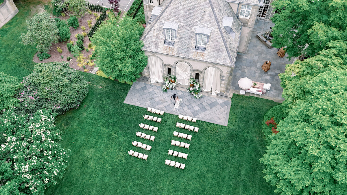 aerial drone shot of glen manor wedding ceremony