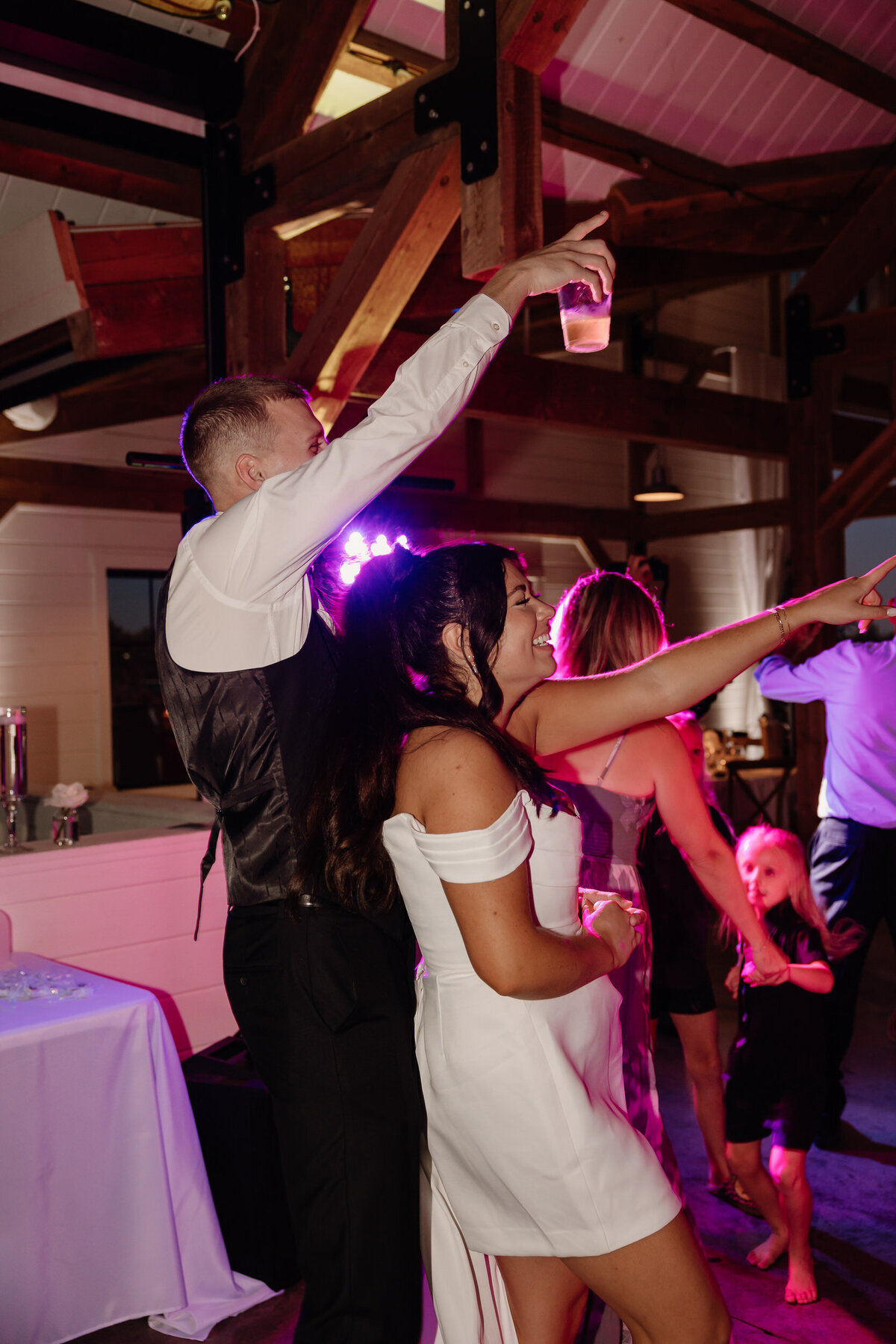 Newlyweds dancing at their wedding reception