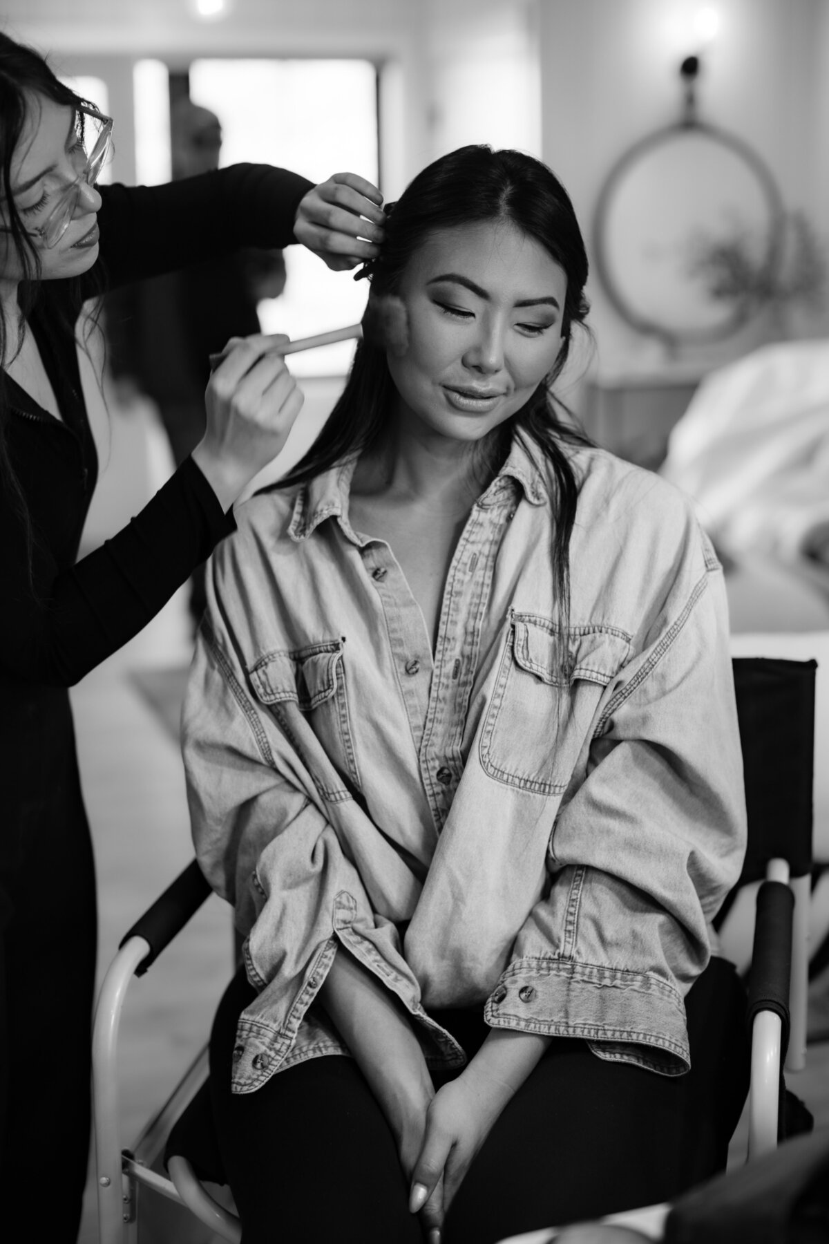B&W Asian Lady Getting Makeup Done