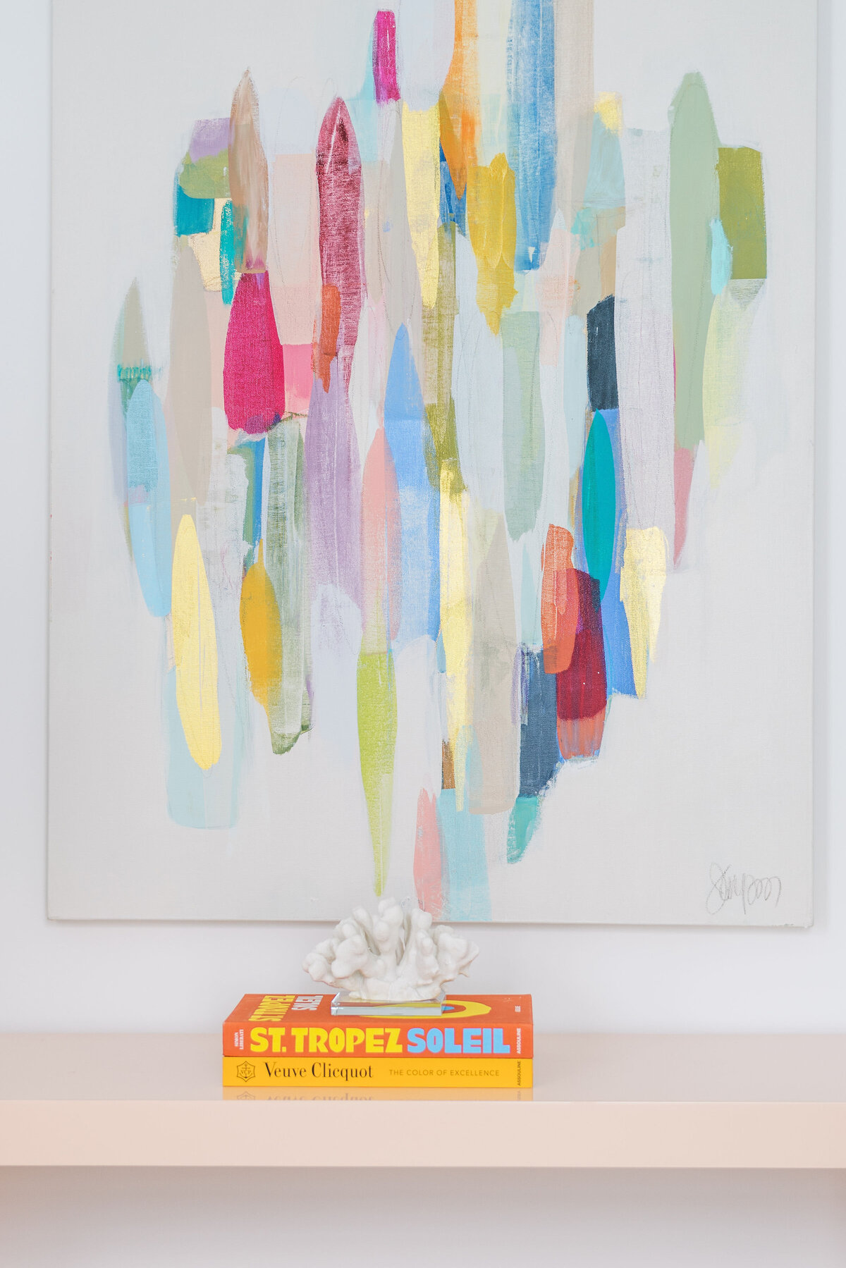oyster creek studios galveston beach remodel colorful painting and books