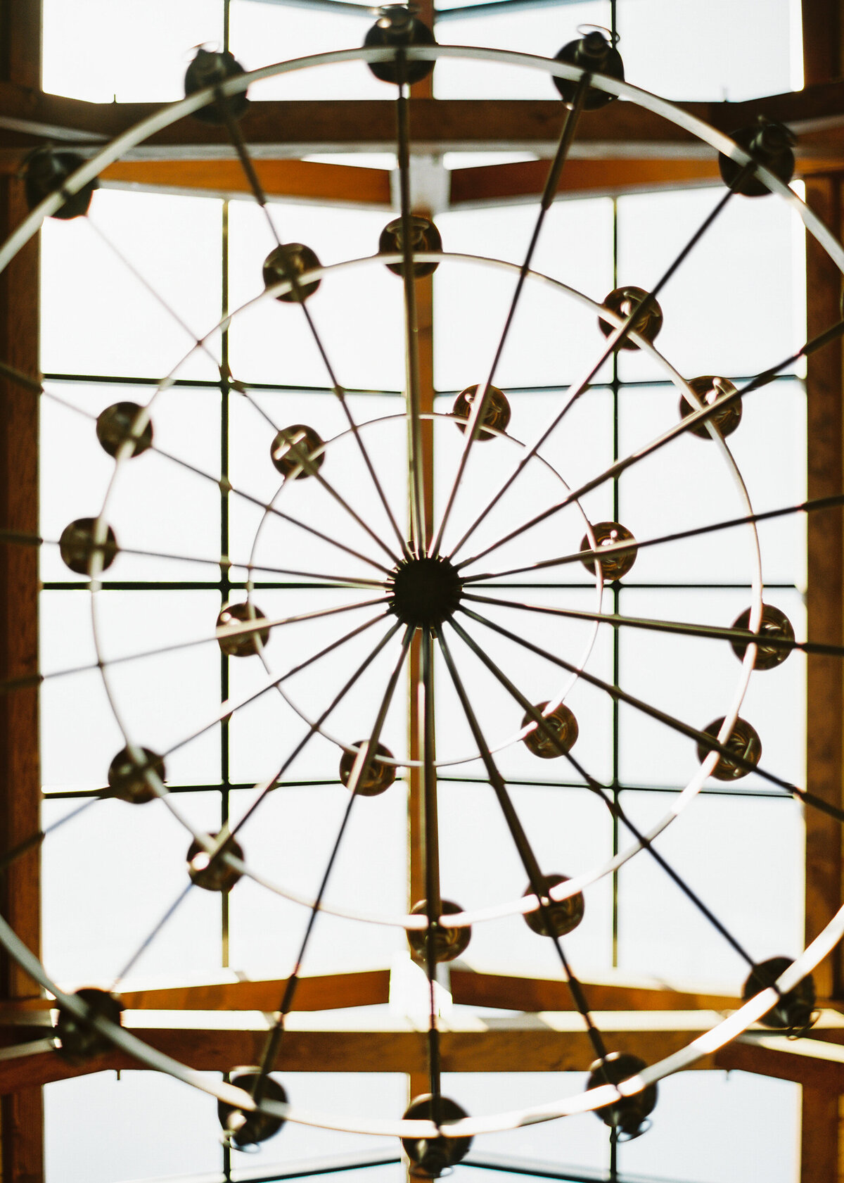 Photo of the chandelier in the Wildflower On Watts venue taken from underneath