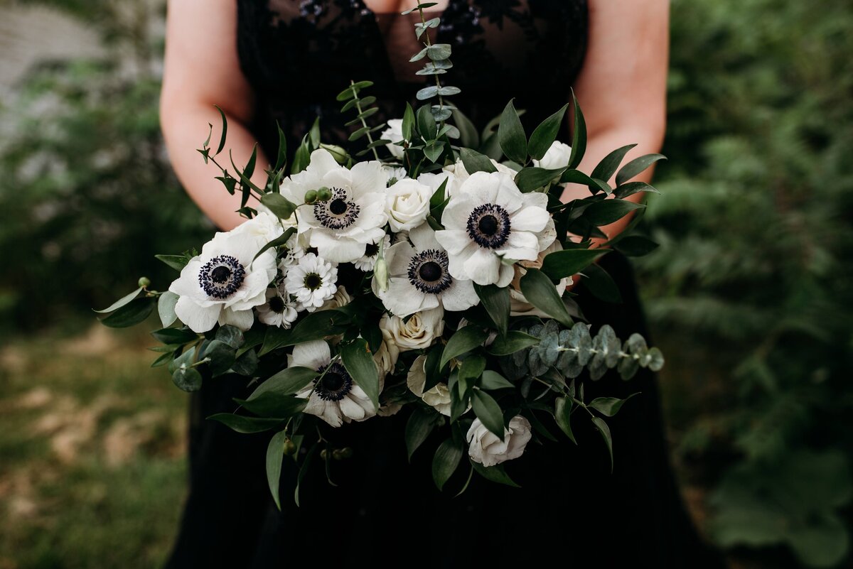 Wedding Bouquet with bride in a black dress