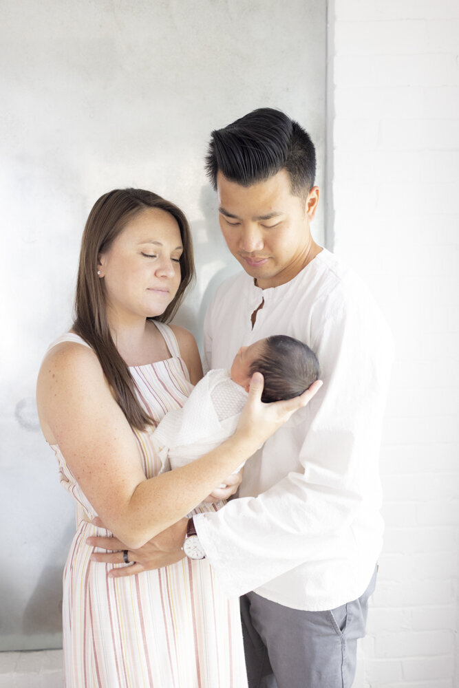 portrait of family with baby boy