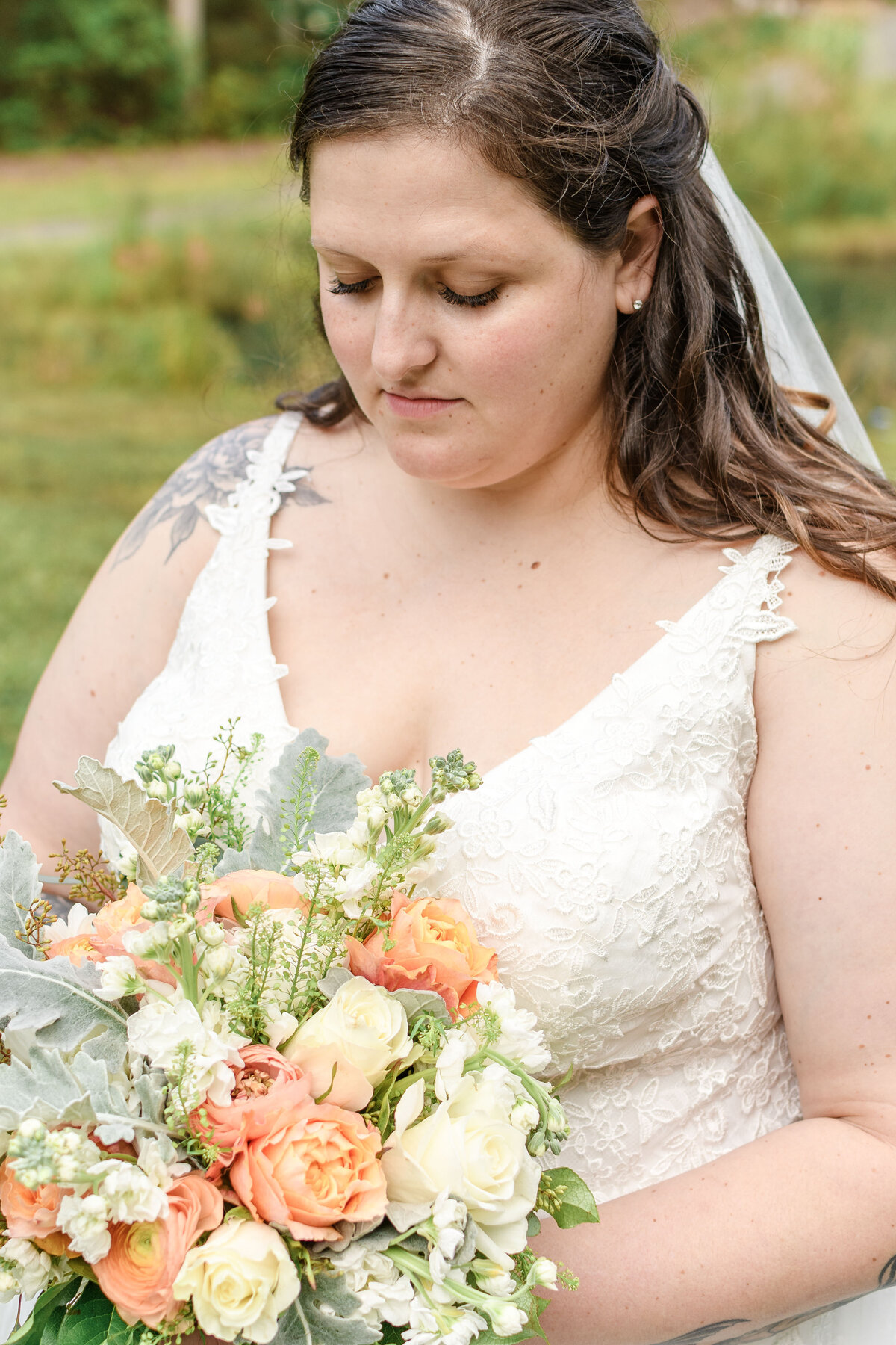 Ashley Hall Photography bride holding her pastel fall inspired bouquet