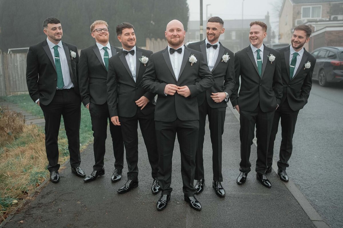 Groom and groomsmen walking together before wedding ceremony – Liverpool photography.