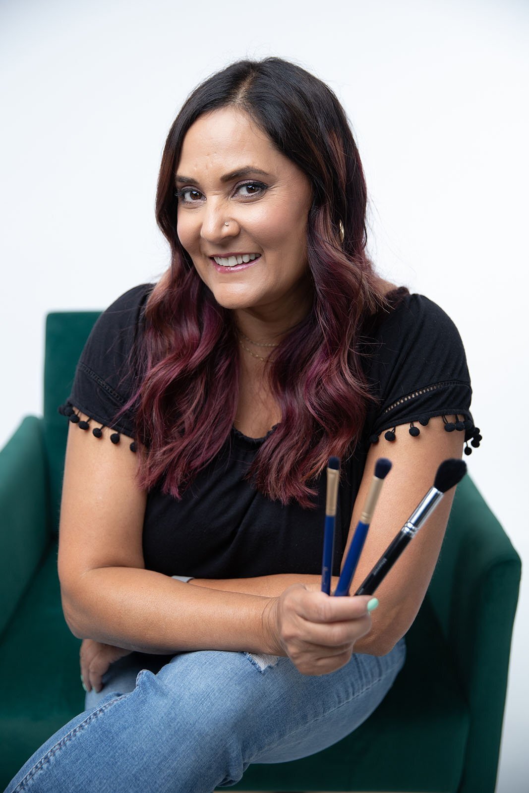 A makeup artist poses during her headshot photography session in Vancouver