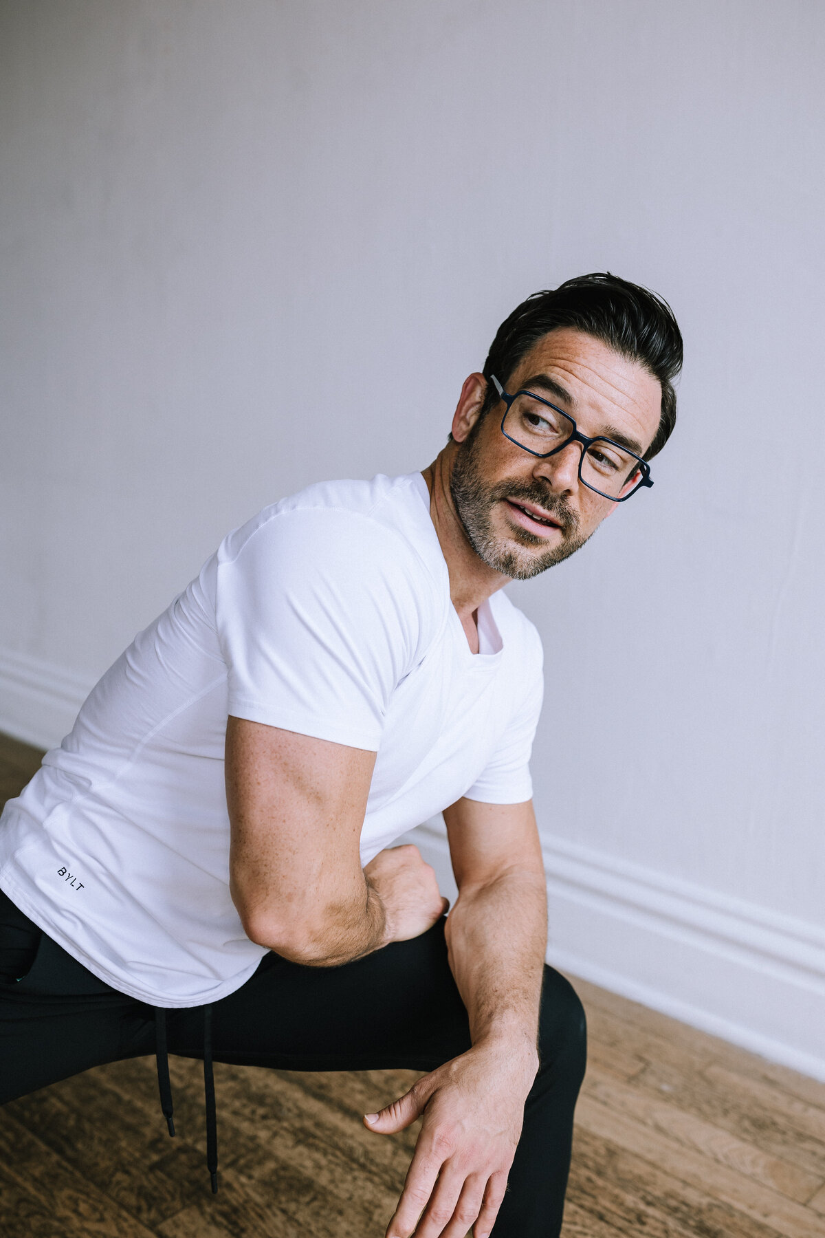 Man wearing glasses for branding photos for North Point Eyewear of Pittsburgh. 