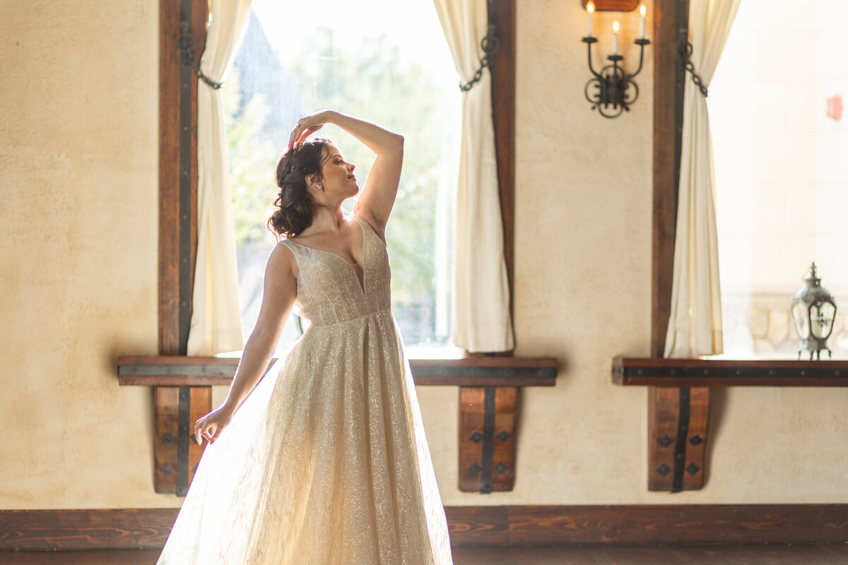 Wedding gown from Versailles Atelier Bridal. Hair and makeup by Brooksby Beauty.