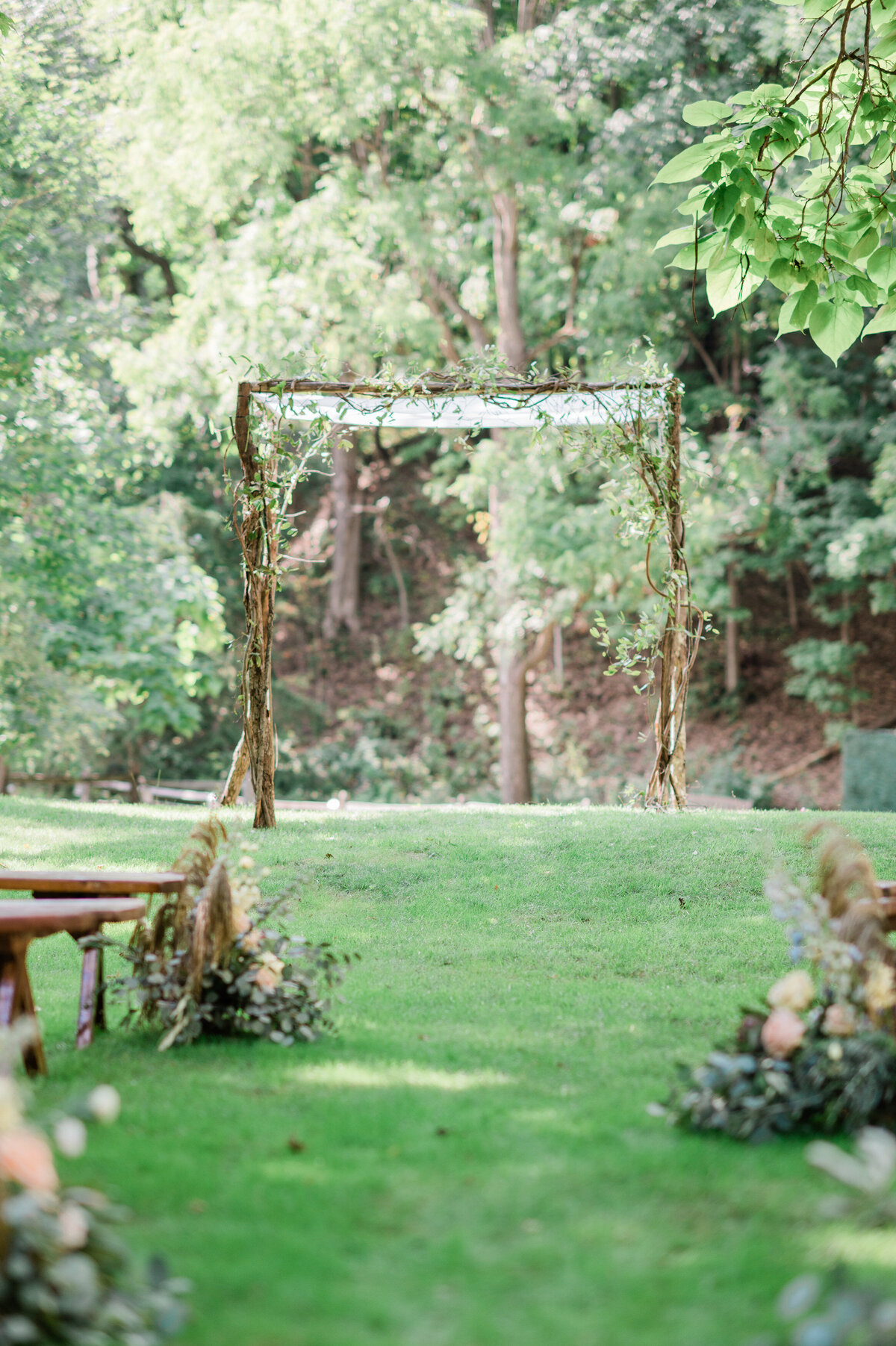 Green grassy aisle of an outdoor Hudson Valley wedding 