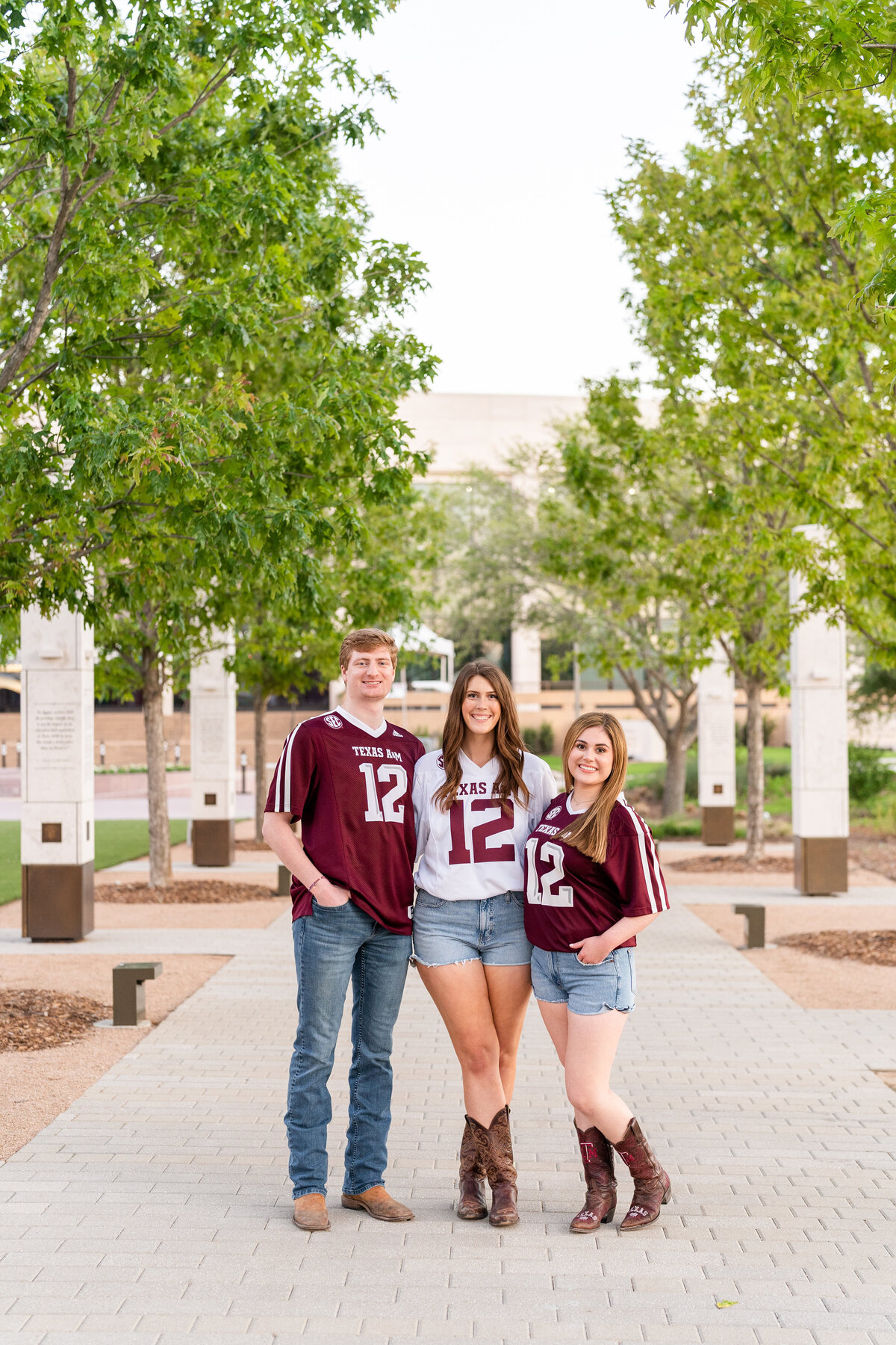 Friend group session at Aggie Park wearing jerseys and arms around each other