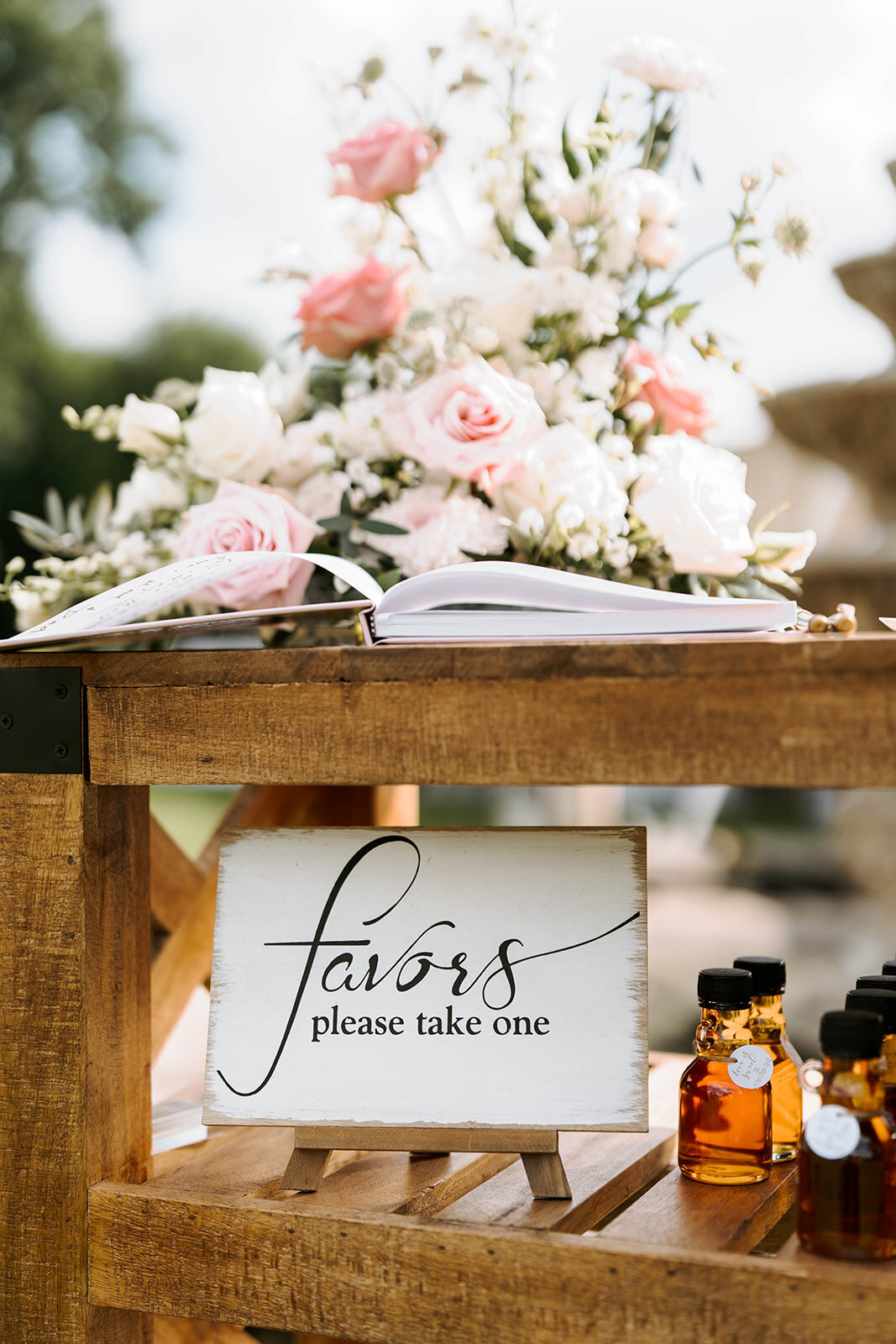 rustic wedding favor sign on guest book table