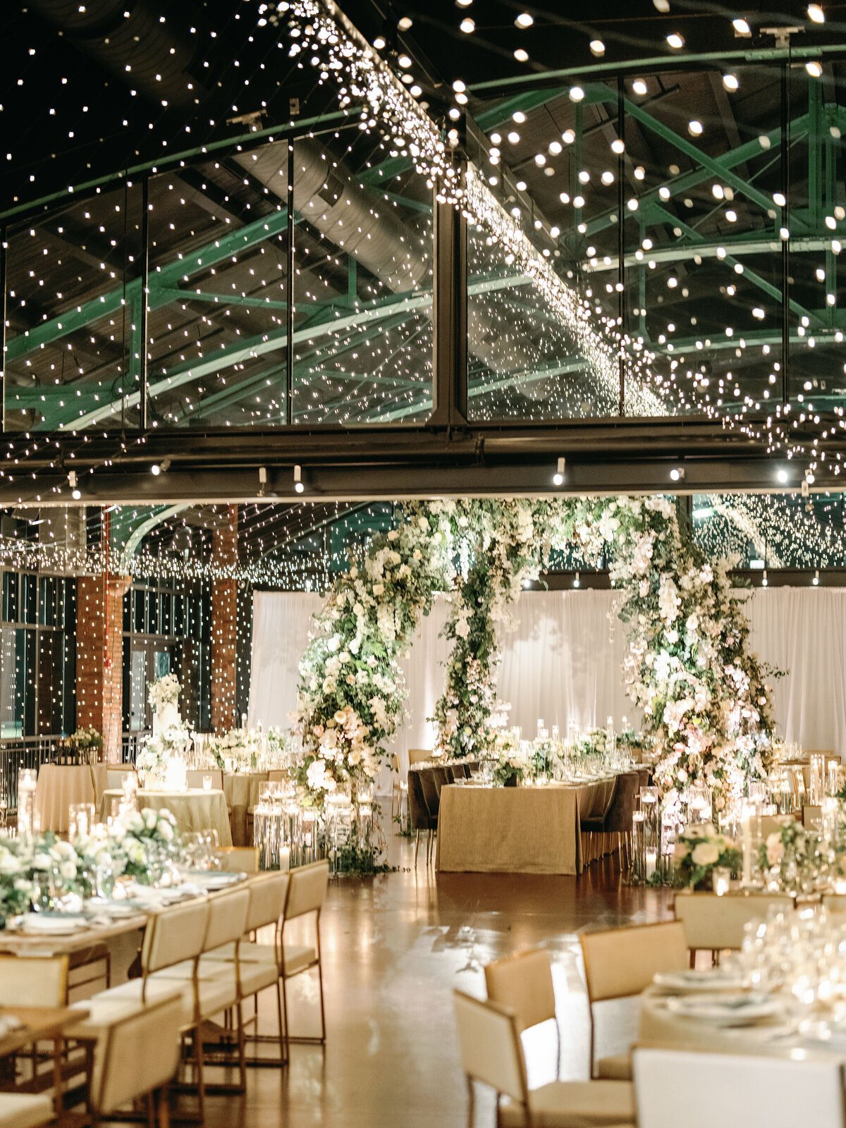 A Dreamy Wedding Reception with Twinkling Lights and Lush Florals