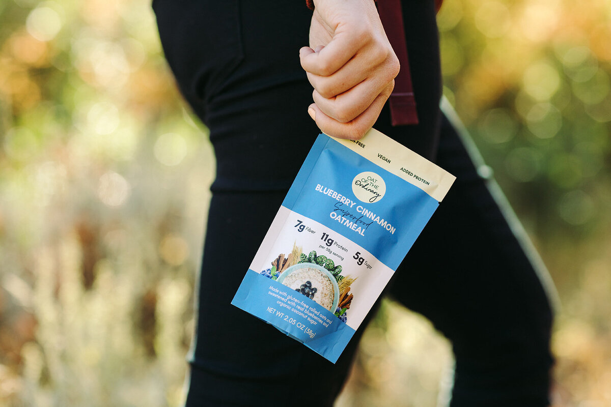 Utah Family Photographer captures woman holding oats during product photos