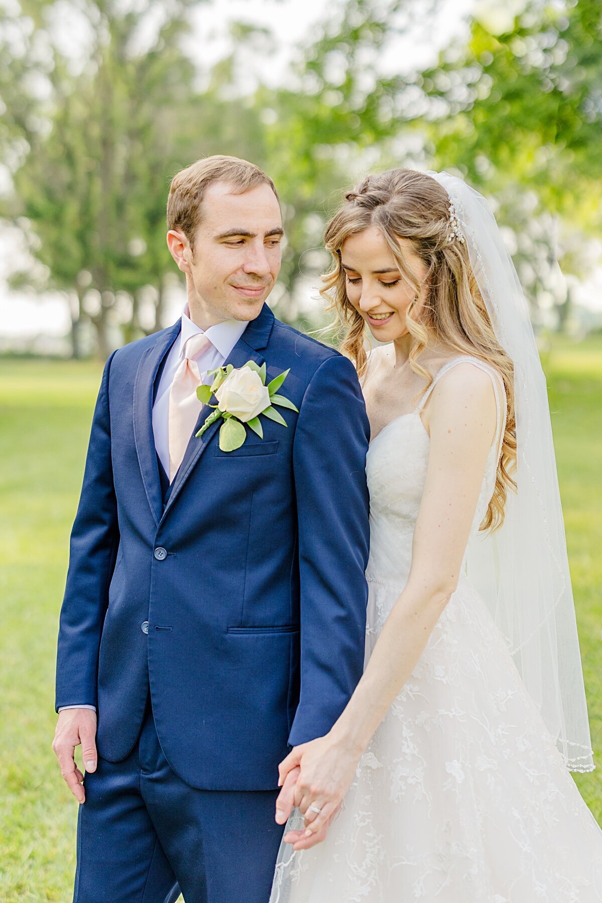 bride-and-groom-holding-hands