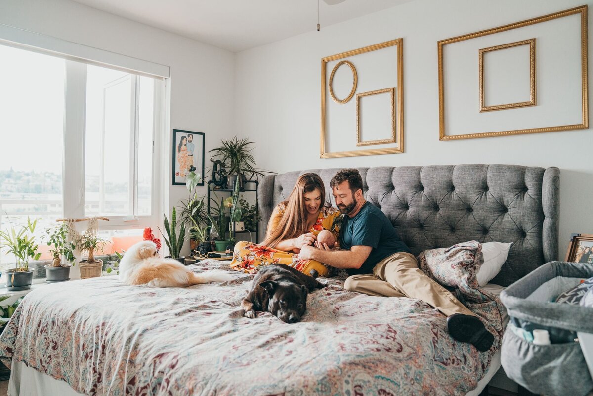 couple-holding-their-newborn-son