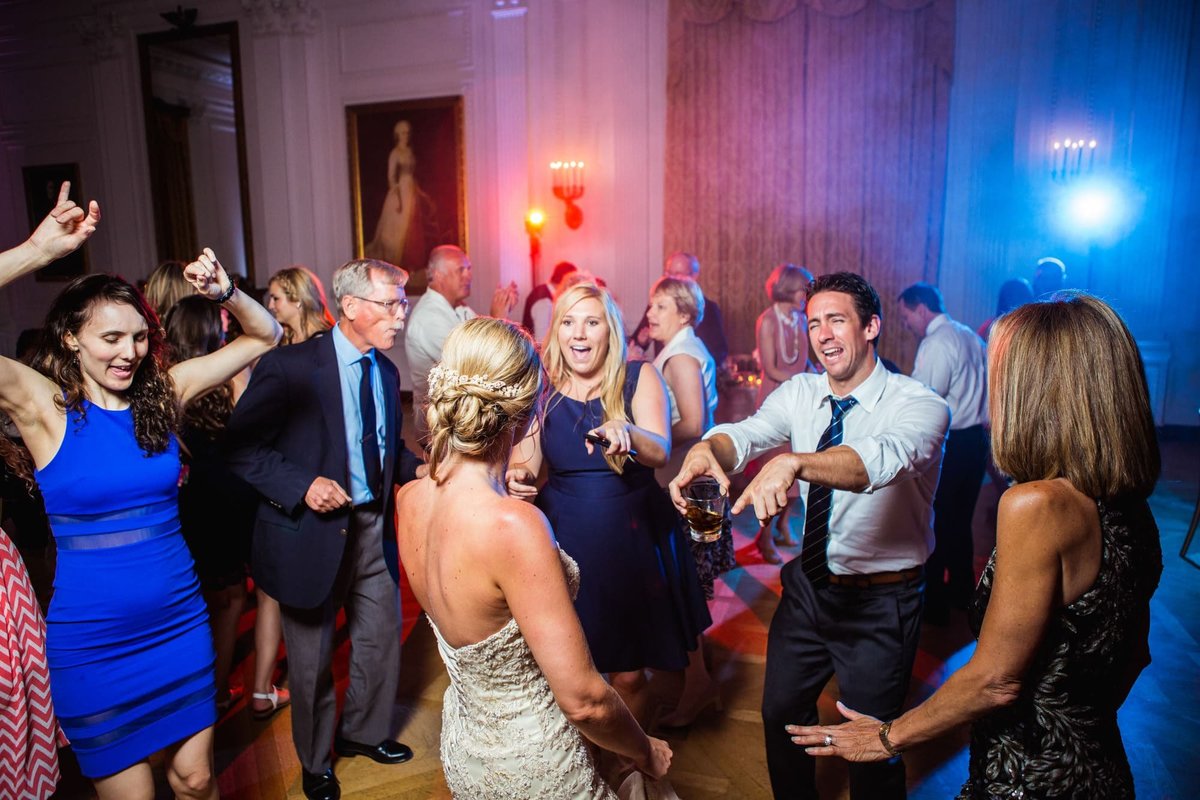 Bride and Groom dance with guests