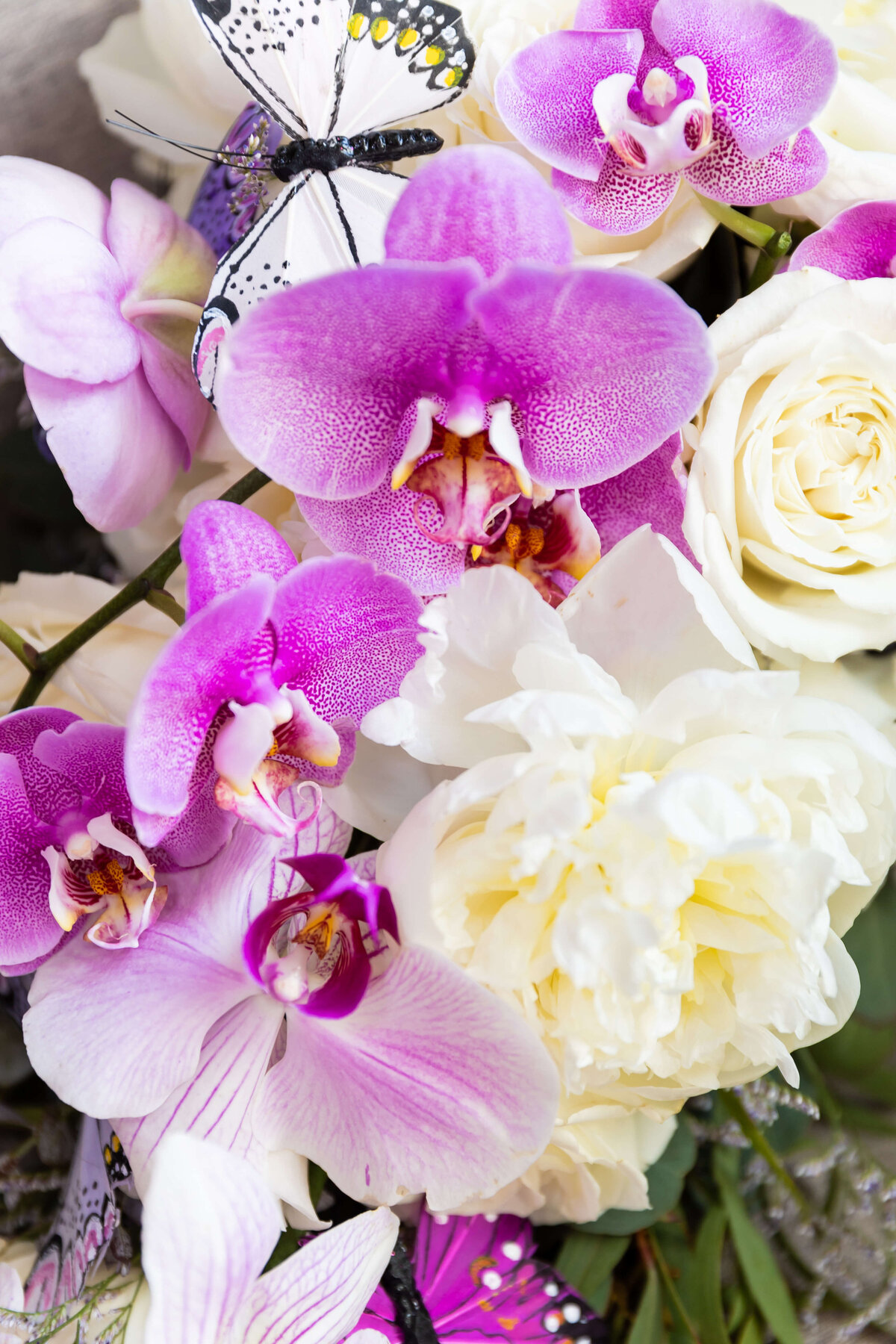 Purple orchids with white florals for wedding at The Aertson hotel, Nashville