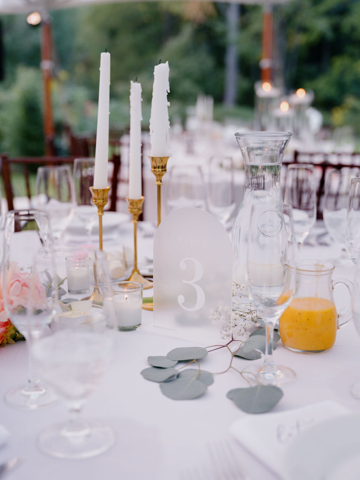 Elegant tented reception at private estate wedding