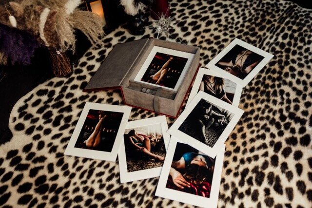 Boudoir photography printed images on leopard rug in Lubbock, Texas photographer in Amarillo TX