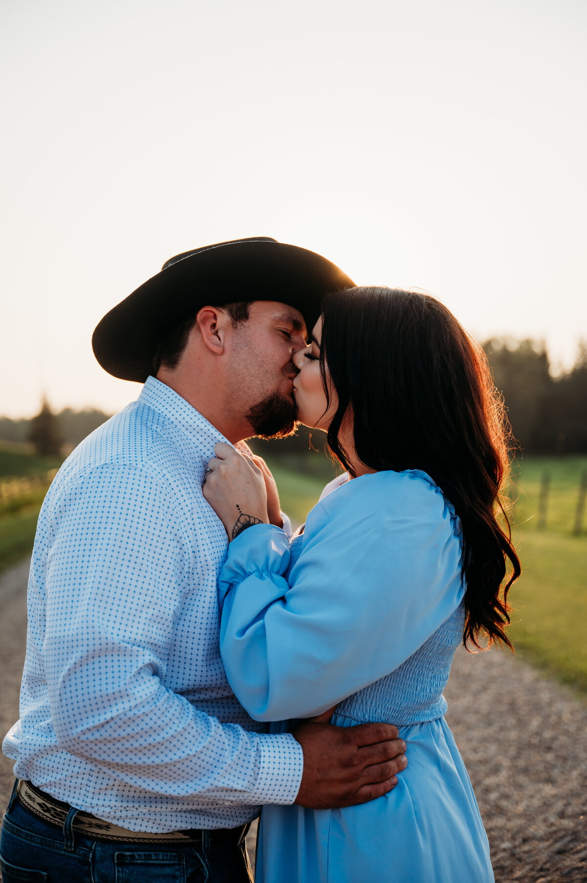 cowboy kisses his fiance