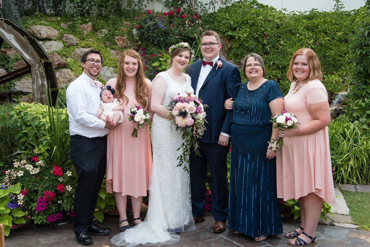 My family, left to rightL Tyler (brother-in-law), Evelyn (niece), Lauren (sister), Sam (sister-in-law), Spencer (brother), Lisa (mom), and me!