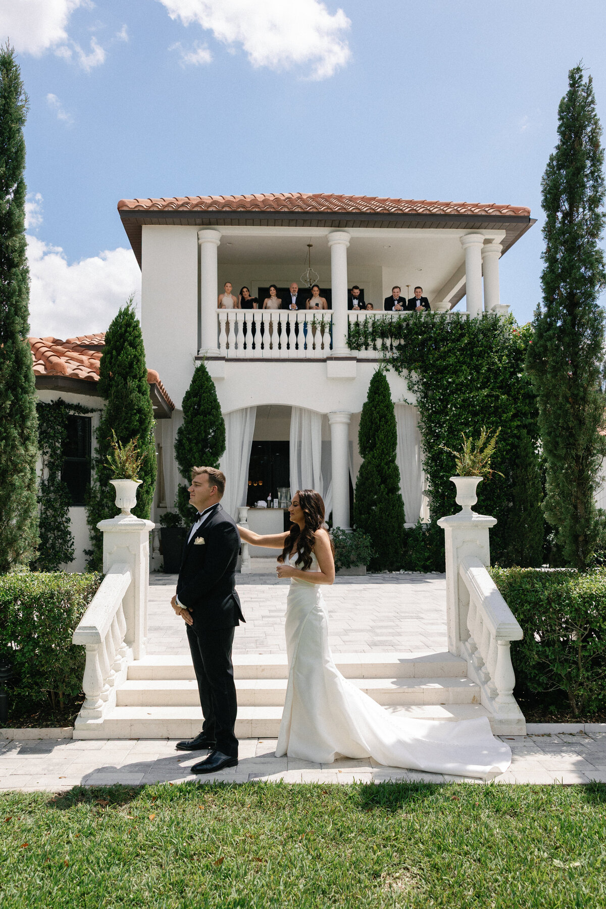 Emotional first look moment between bride and groom at La Casa Toscana