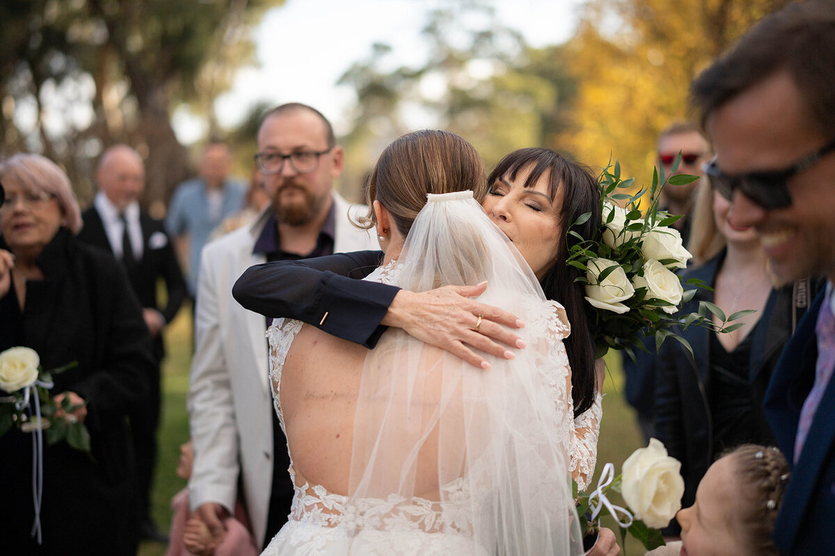 people congratulating the bride