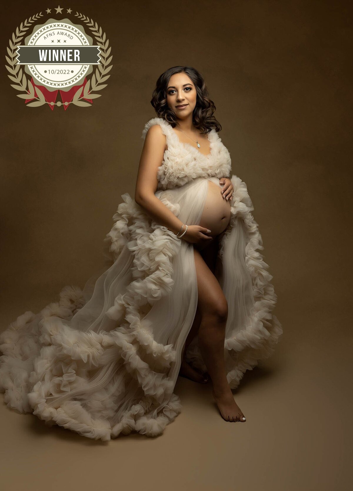 Maternity Photographer, a pregnant woman in a dress -Badge for AFNS Award 2022