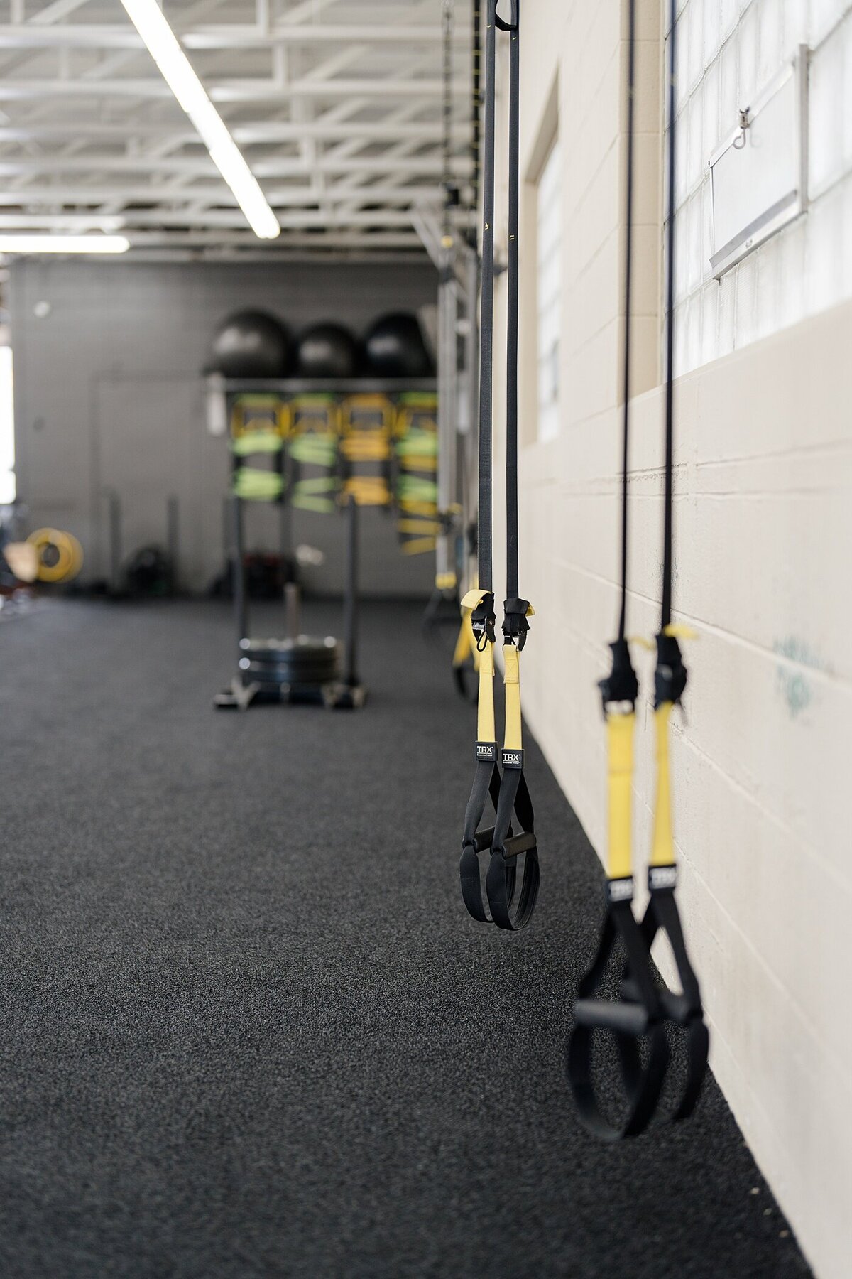 personal branding photography with equipment in a gym