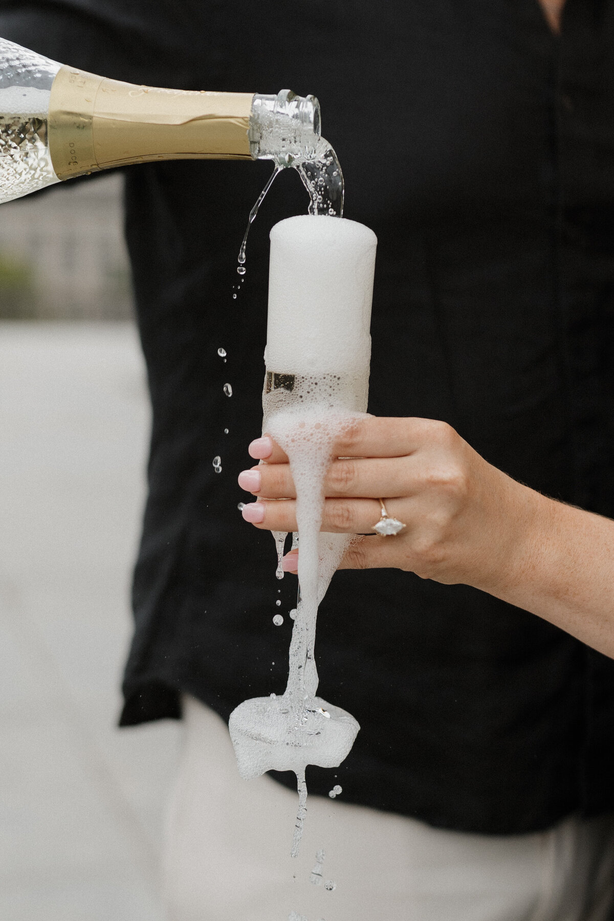 Indianapolis engagement photographer champagne celebration photo