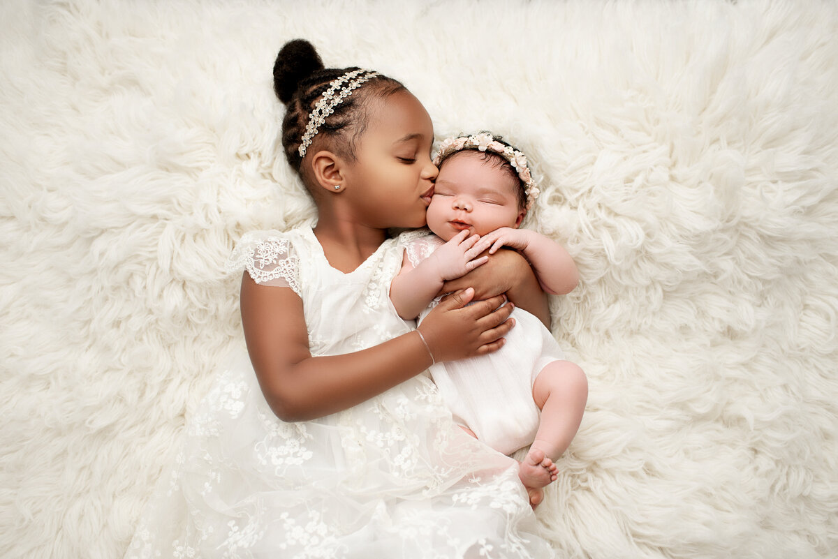 Newborn with Sister Sibling
