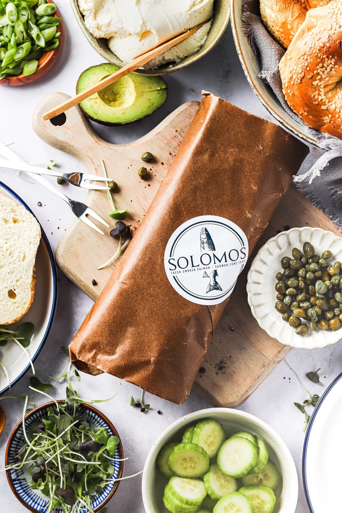 food wrapped in butcher paper and sealed with a branded Solomos sticker