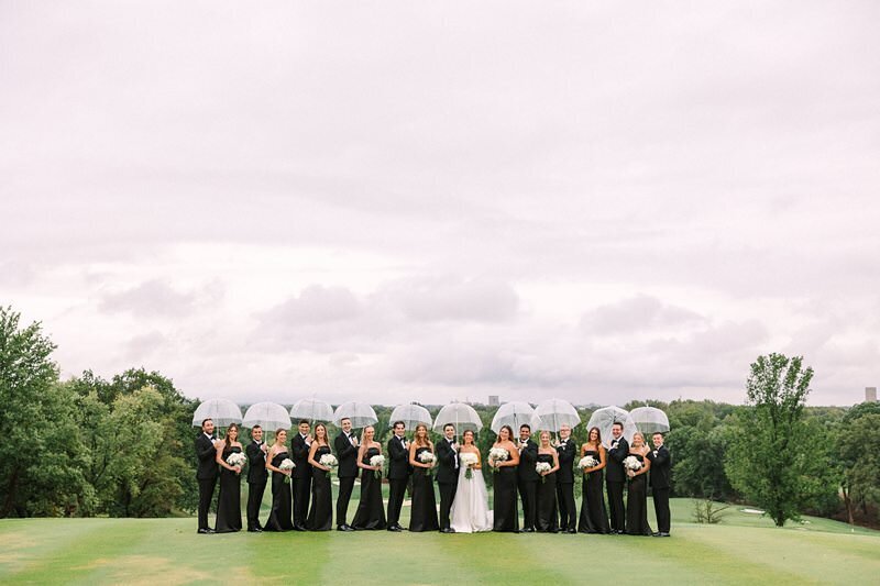 bride-and-groom-rainy-umbrella-evansville-country-club13
