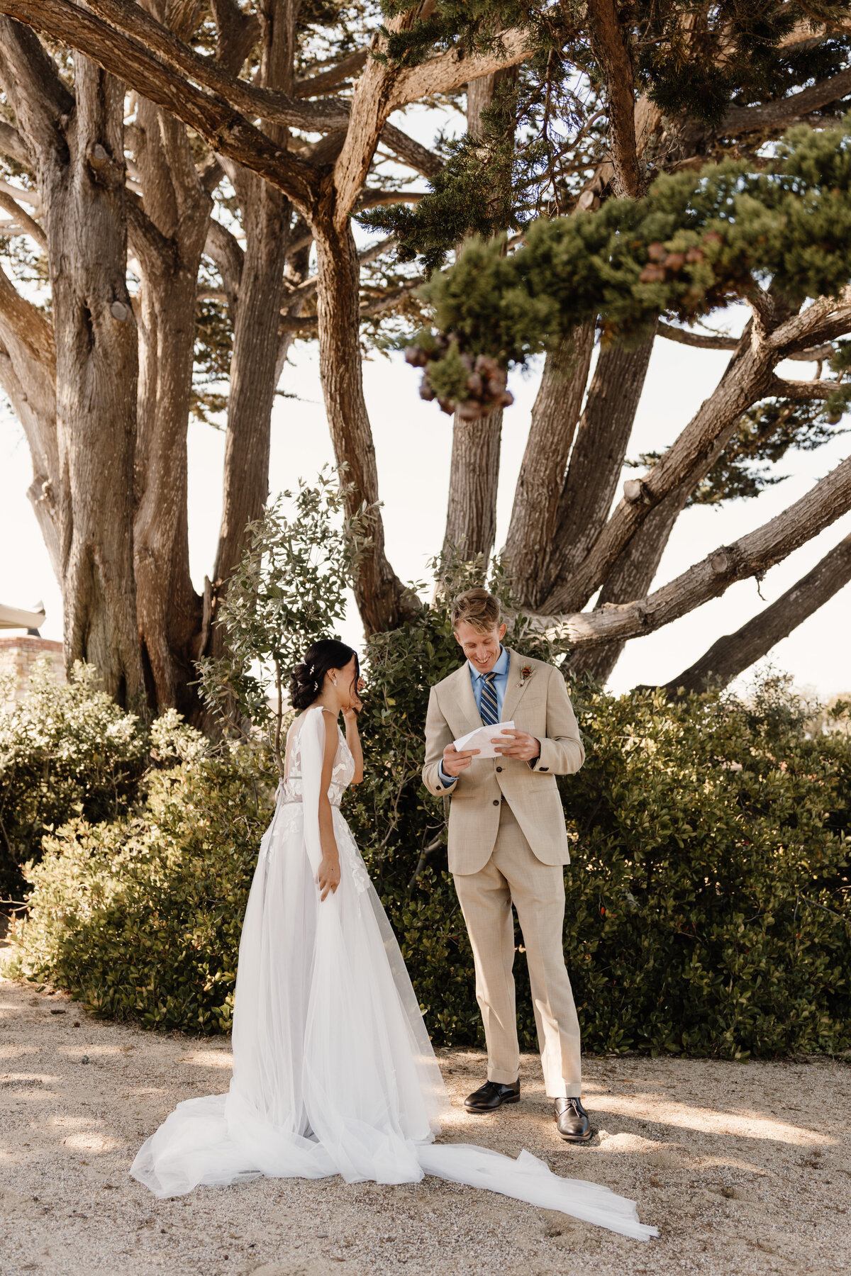 groom reads letter from bride on elopement day