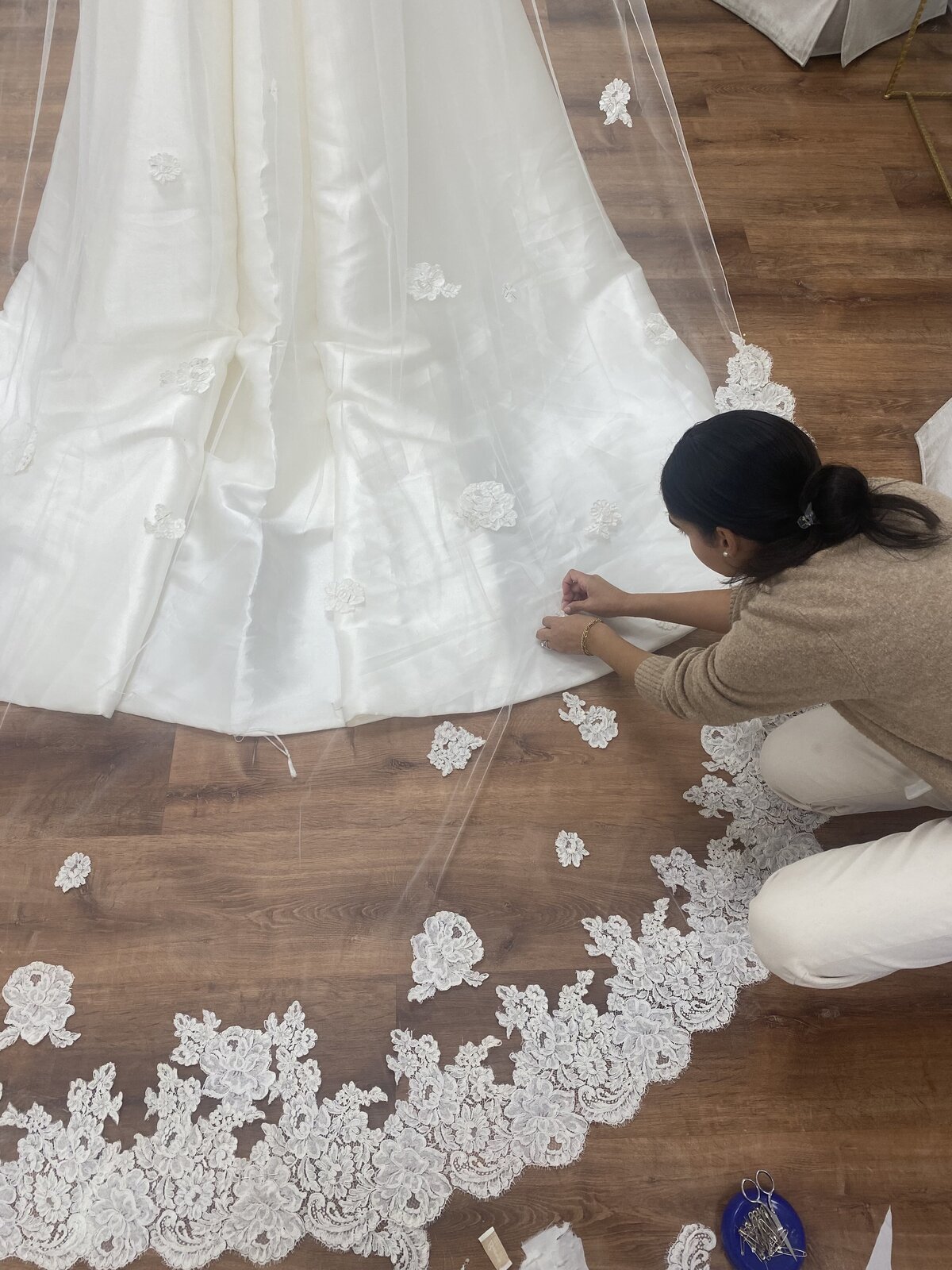 ellie-working-on-meghan-wedding-gown-2