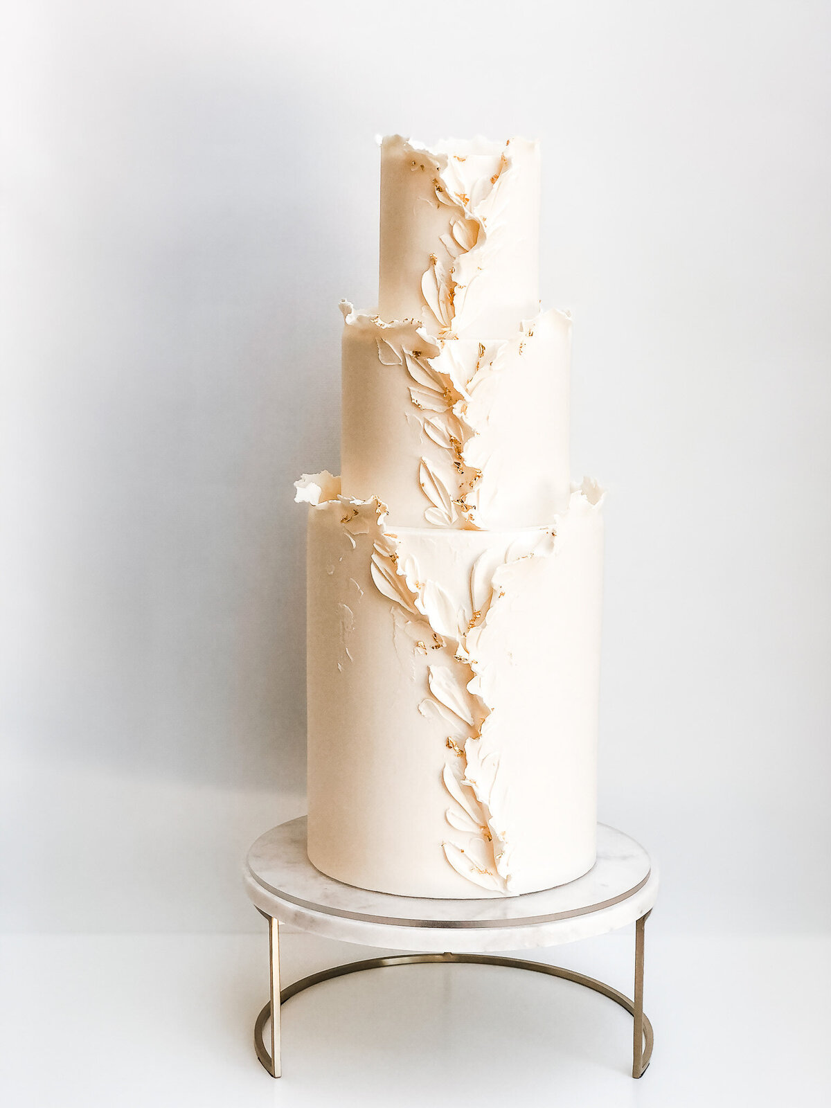 torn fondant wedding cake