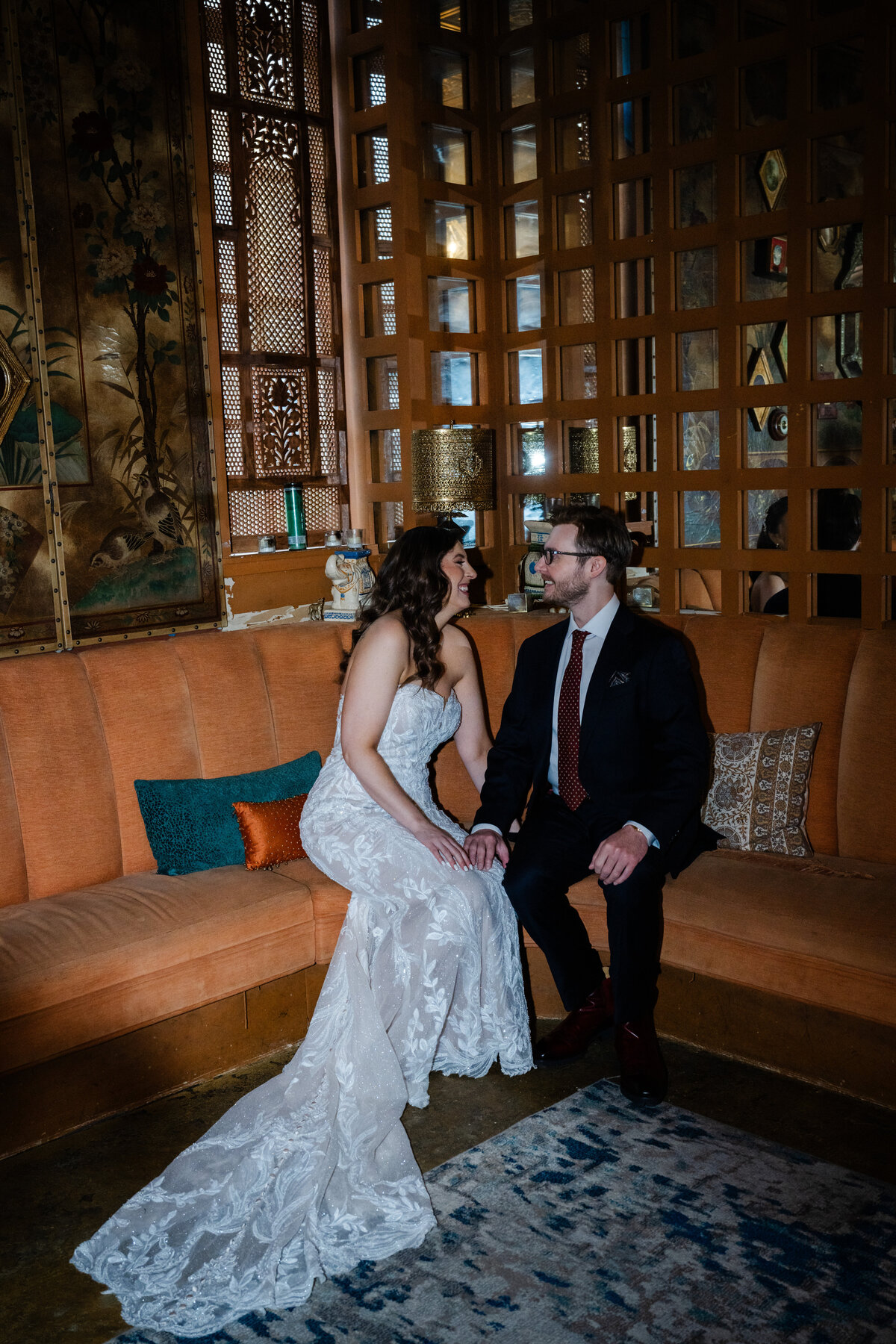 bride and groom in lounge room at the ruins seattle venue
