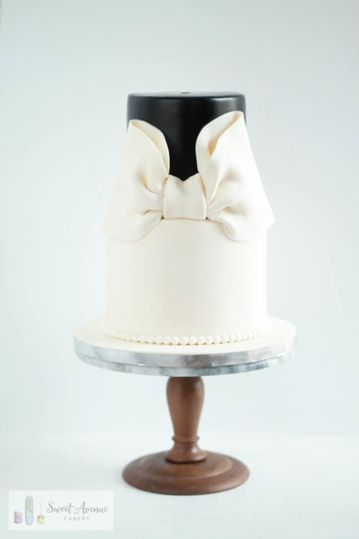 elegant black and white bow cake