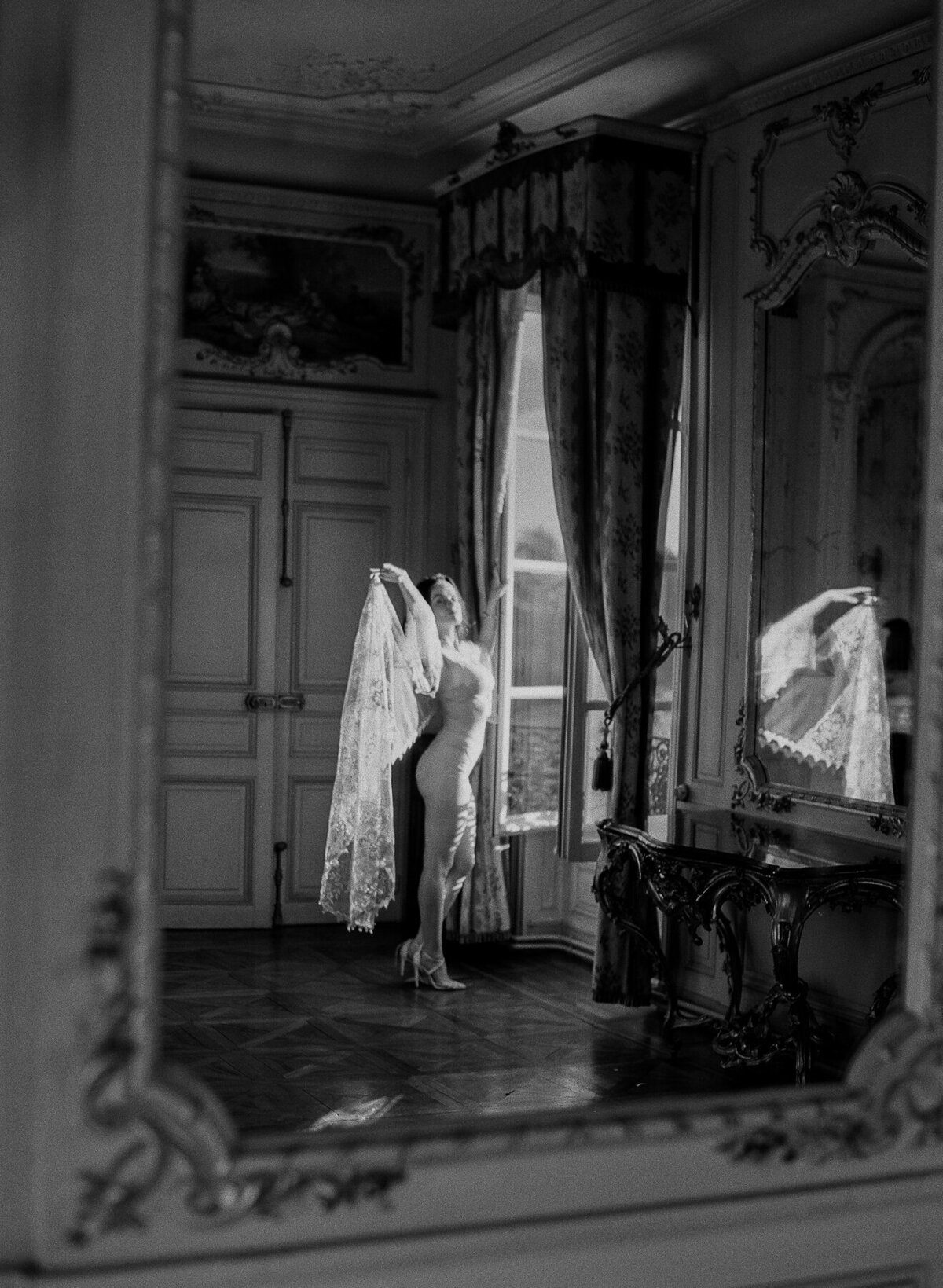 beautiful bride getting ready in a chateau