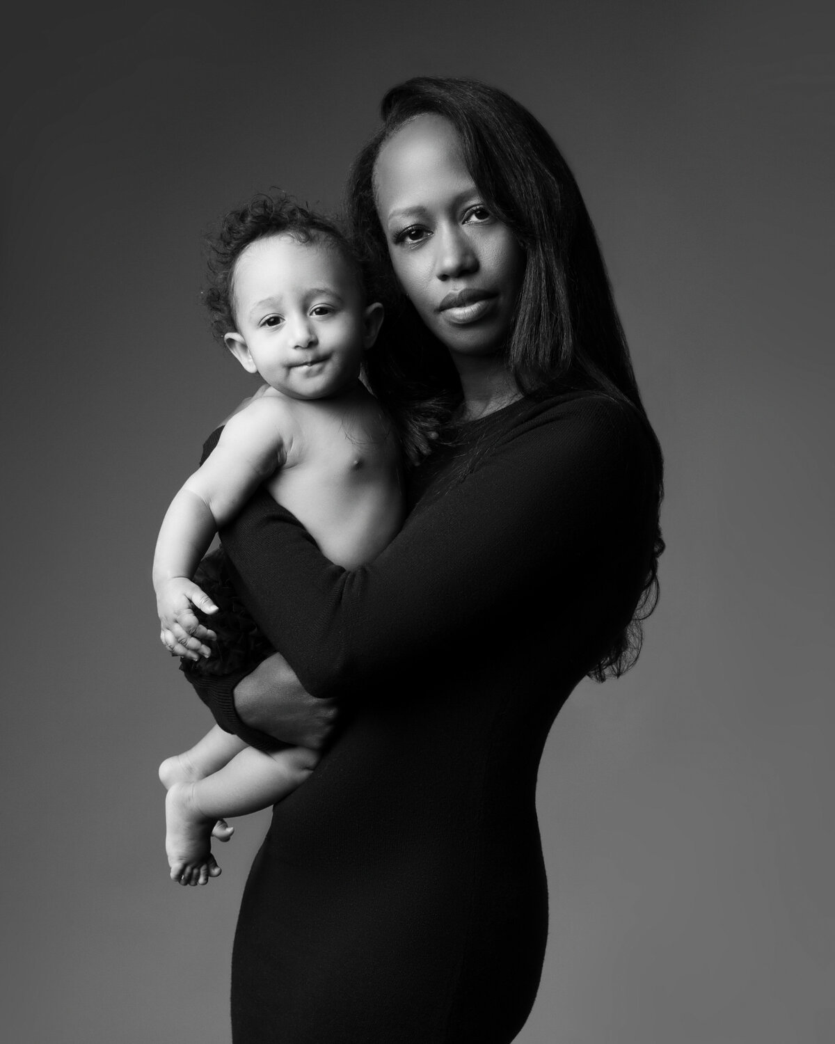 Timeless black and white family portrait by Daisy Rey in New Jersey photo studio