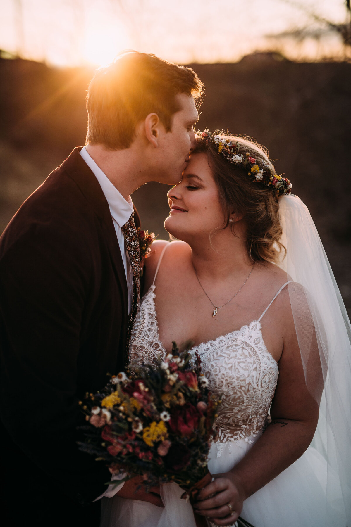 bride in a flower crown sunset photos