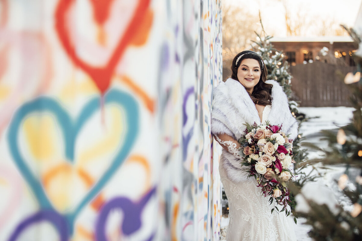 Hamilton Manor | Bride posing with flowers during winter wedding | Hamilton Township, New Jersey