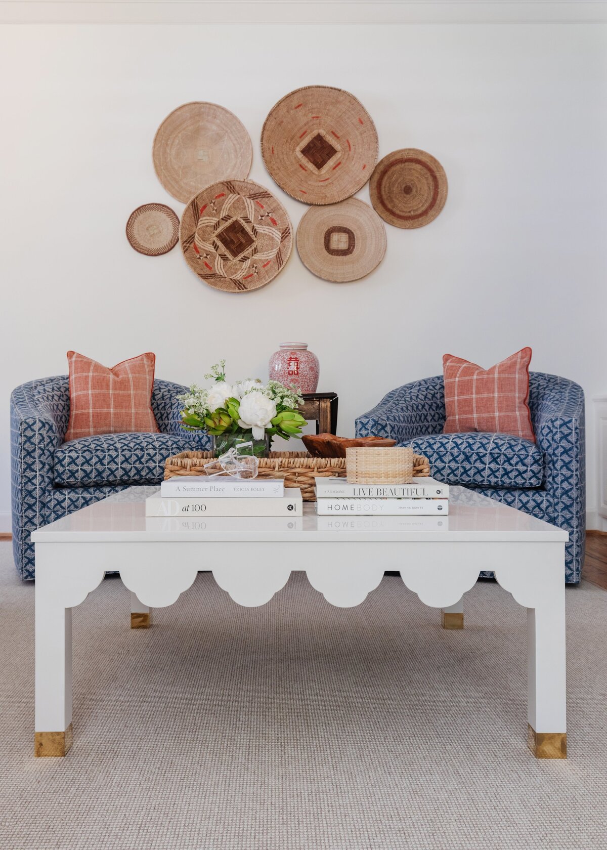 oyster creek studios oak forest remodel white coffee table and blue arcmhairs with wooden plate decorations on walls