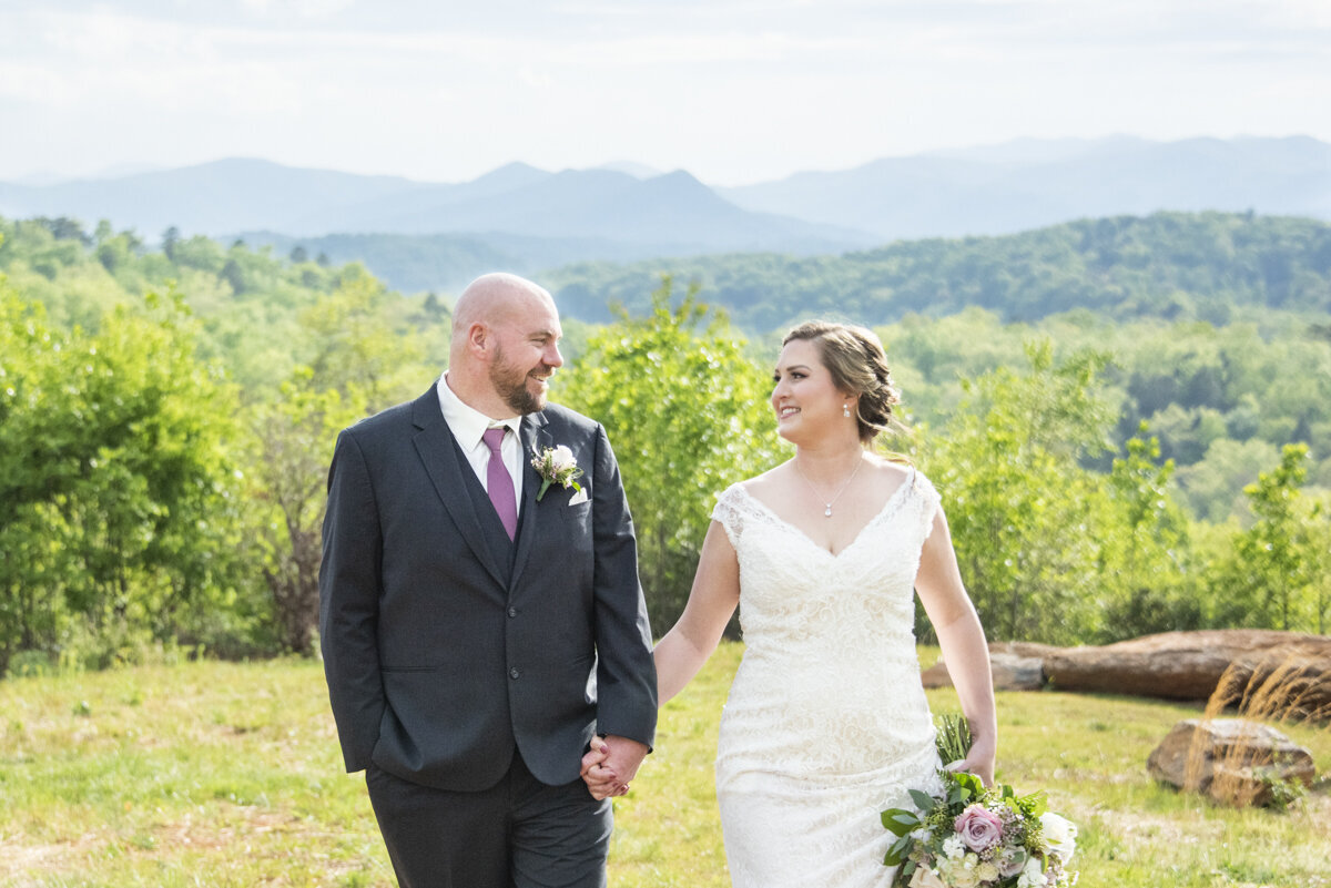 Couple walking at Something Blue wedding venue