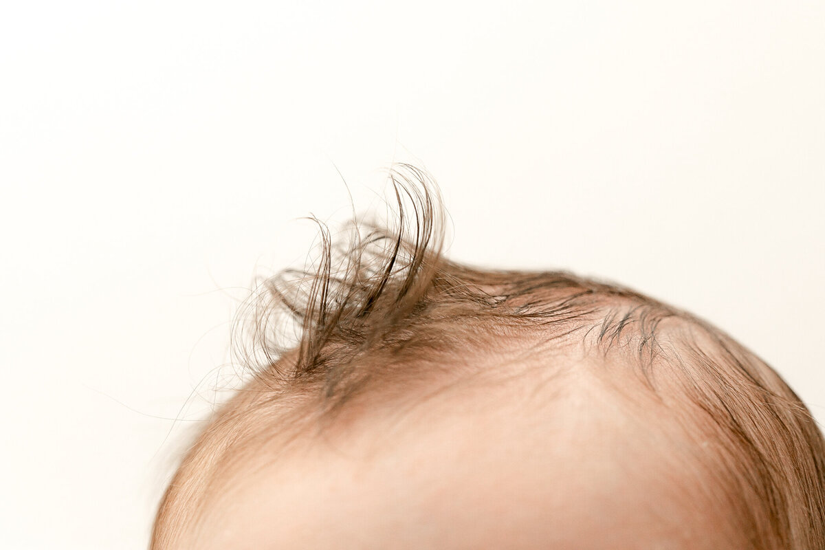 Fresno Newborn Photographer capturing close up details of baby hair