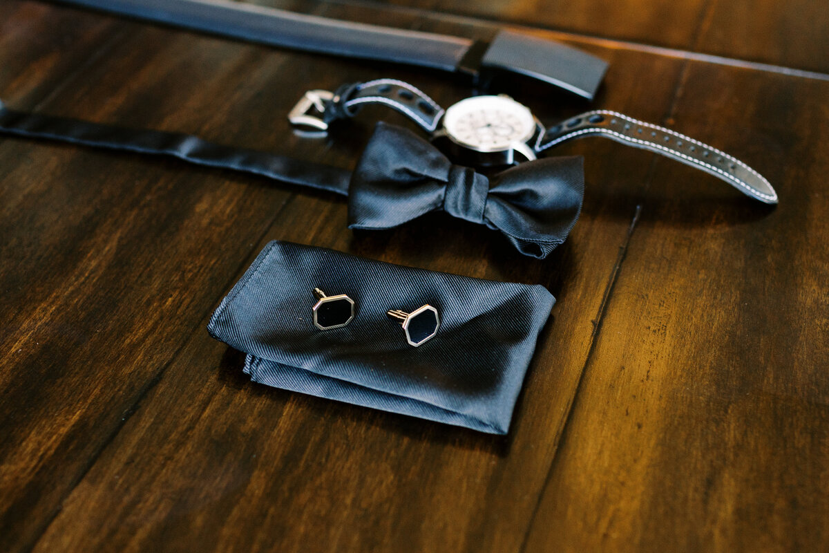 detail shot of the grooms accessories